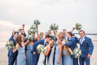 pastel blue maxi bridesmaid dresses with spaghetti straps and draped waists look chic and elegant