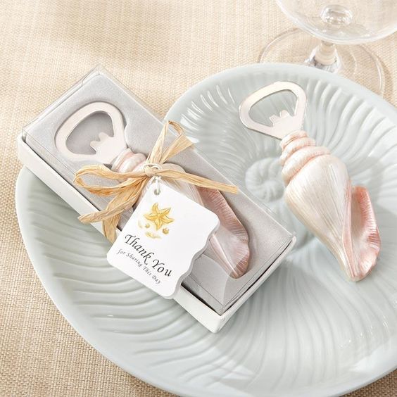 seashell bottle openers are stylish and practical beach wedding favors, add tags and enjoy