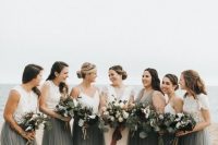 stylish beach bridesmaid separates with white plain and lace crop tops and a graphite grey tulle skirts