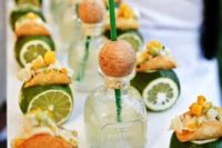 tequila and tacos served on whole limes is a fantastic idea for a couple that loves Mexican cuisine