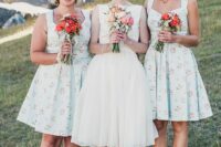 A-line knee mint blue bridesmaid dresses with thick straps, no sleeves, pleated full skirts and red shoes
