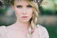 a cute bride with an oversized floral crown