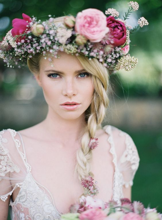 a cute bride with an oversized floral crown