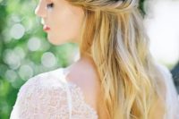 a casual twisted half updo is a timeless solution for any romantic bride, it can be worn at a beach or some other wedding
