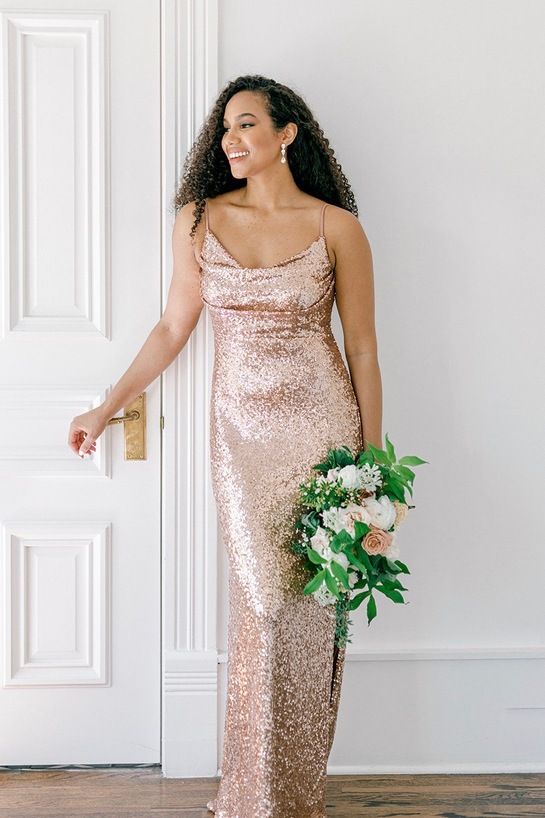 a rose gold maxi bridesmaid dress with spaghetti straps and a neutral wedding bouquet are a cool combo for a glam wedding