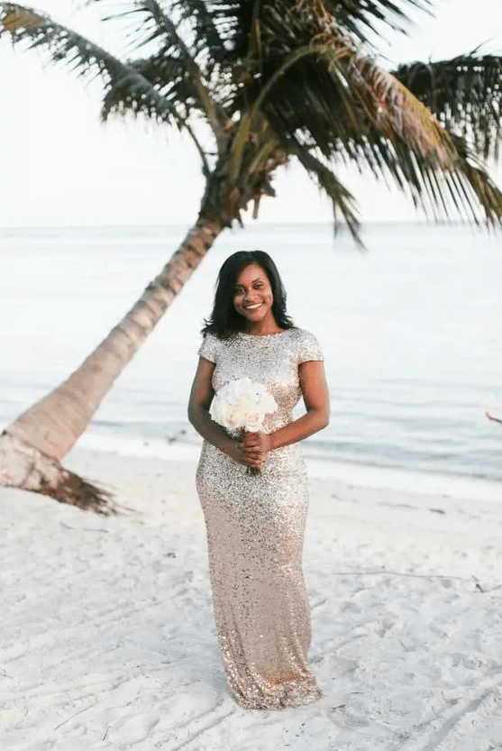 a rose gold sequin maxi dress with short sleeves and a high neckline for a glam bridesmaid