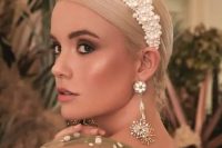 a statement pearl headband will make your look very whimsical and very bold, perfect for a glam bride