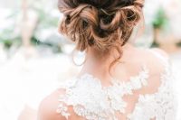 a wavy updo on medium length hair with a bump on top is a very elegant and refined idea