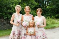 beautiful and feminine floral midi A-line bridesmaid dresses with high necklines, no sleeves, silver peep toe shoes