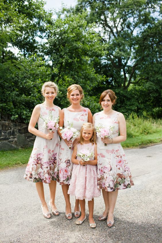beautiful and feminine floral midi A-line bridesmaid dresses with high necklines, no sleeves, silver peep toe shoes