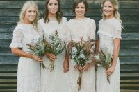 beautiful mismatching white boho lace midi bridesmaid dresses with vintage detailing are a lovely and beautiful idea for a boho wedding