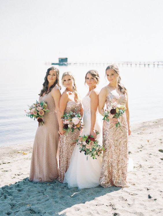 embellished and sequin maxi bridesmaid dresses are a cool and catchy idea for any wedding including a coastal one