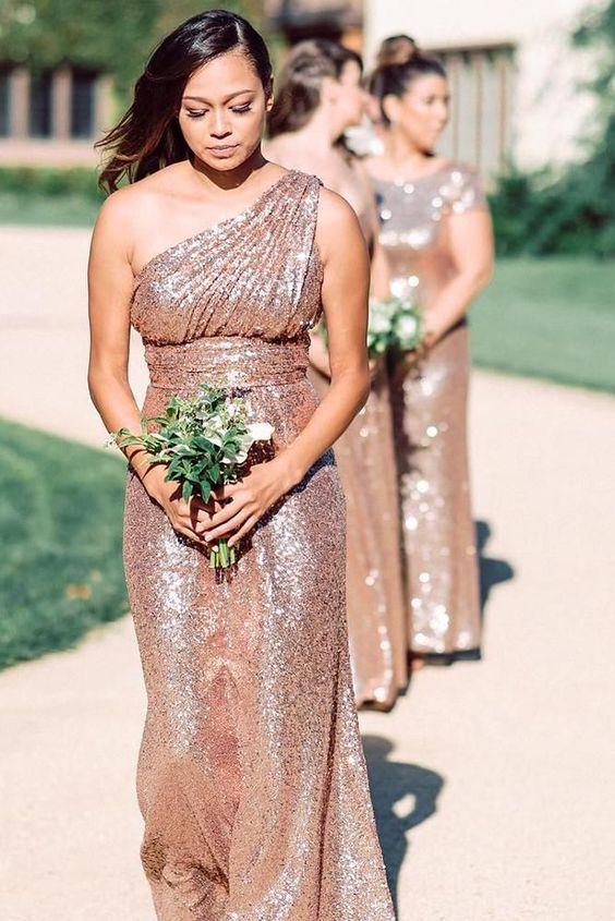 glam and shiny rose gold one shoulder bridesmaid dresses with draped bodices are a cool idea for a glam wedding