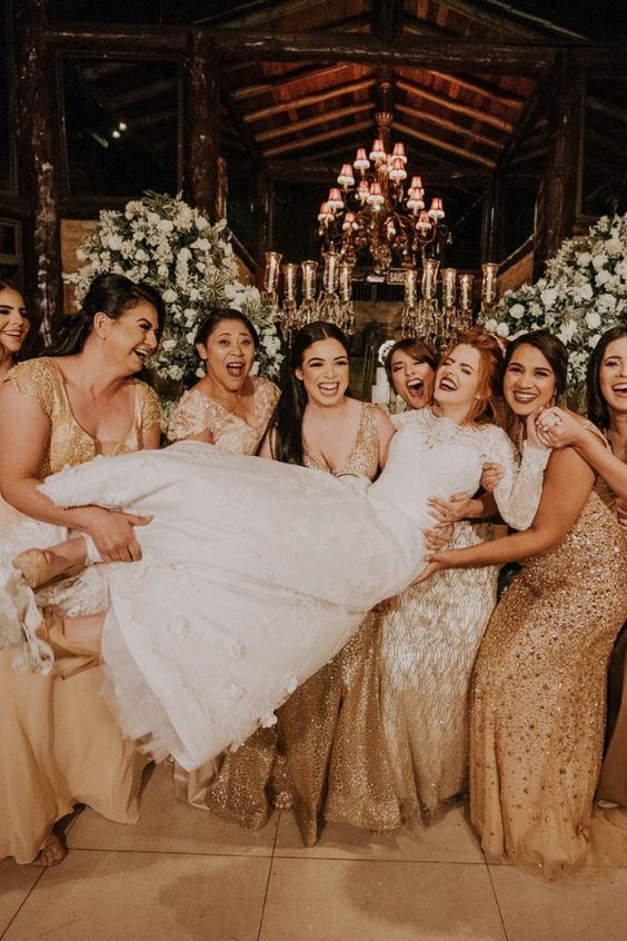 gold embellished and sequin maxi bridesmaid dresses are a cool solution for a shiny glam wedding
