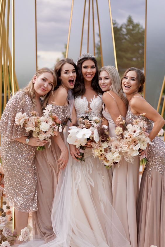 lovely mismatching blush sequin bridesmaid dresses for a glam and shiny wedding with a neutral color palette