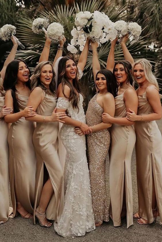 lovely mix and match neutral maxi bridesmaid dresses of satin and sequins, nude and gold shoes for a modern glam wedding