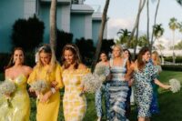 mismatching blue and yellow midi and maxi bridesmaid dresses with various necklines are amazing for a bold vintage wedding