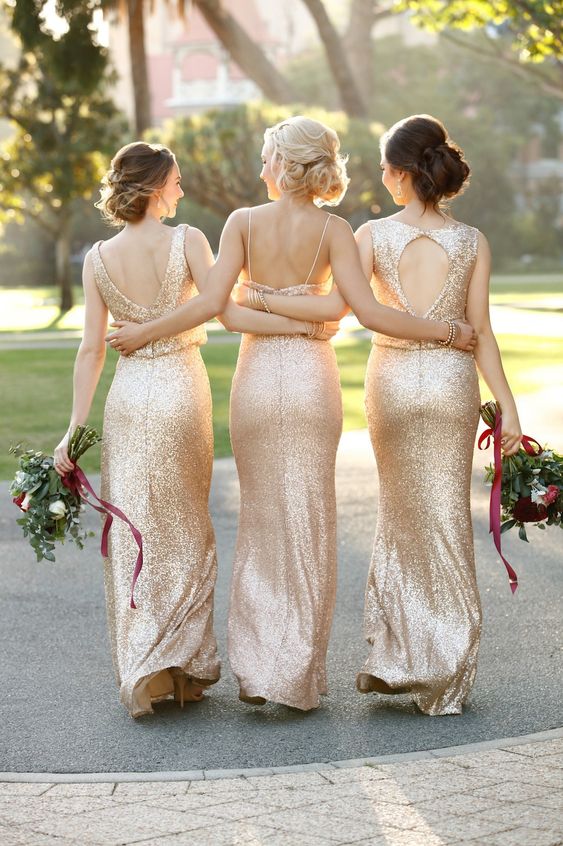 mismatching gold sequin maxi bridesmaid dresses with high heels for a glam and chic wedding in winter