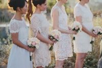mismatching white lace over the knee bridesmaid dresses and silver shoes for a spring or summer elegant weddin