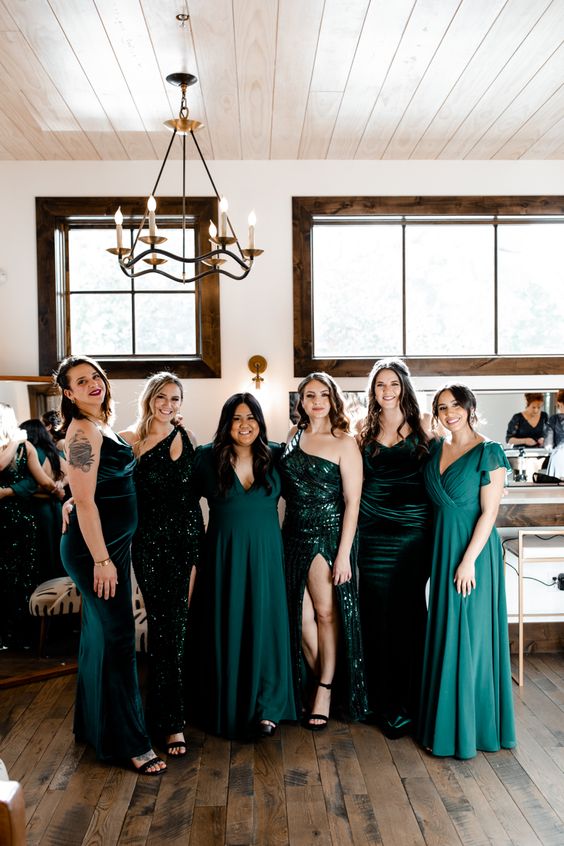 mix and match dark green bridesmaid dresses with sequins and of velvet are adorable for a Christmas wedding
