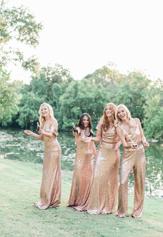 mix and match gold bridesmaid dresses and a jumpsuit are a cool solution for a shiny and glam wedding