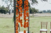 orange floral garlands like these ones will be perfect for an Indian wedding ceremony