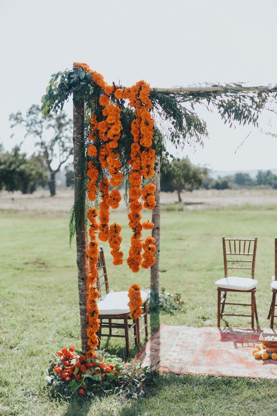 orange floral garlands like these ones will be perfect for an Indian wedding ceremony