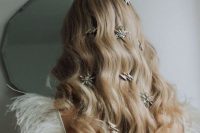 oversized star and thunderbolt rhinestone hair clips are amazing on wavy long hair
