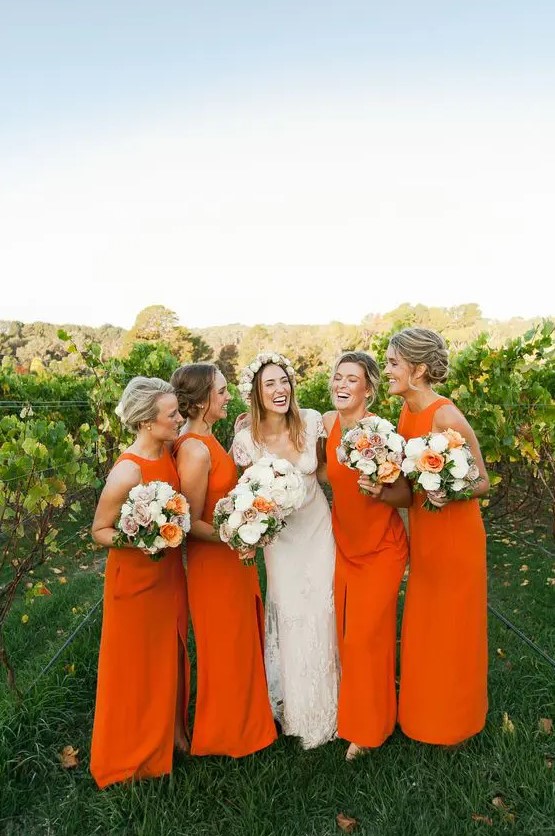 sleeveless orange halter neckline maxi bridesmaid gowns with a front slit can fit a summer or a fall wedding