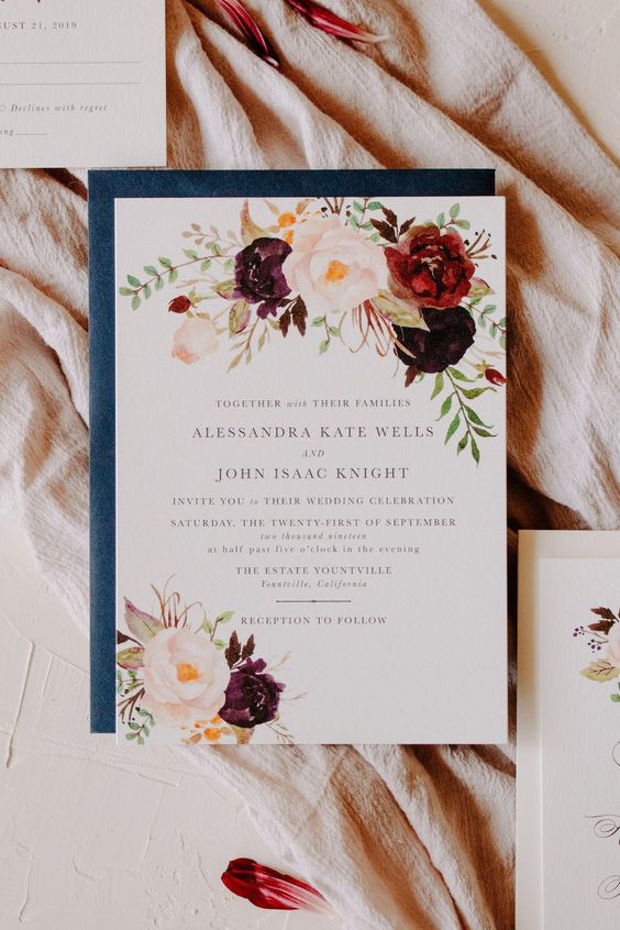 a beautiful fall wedding invitation with bold blooms painted and a blue envelope is a beautiful and refined idea