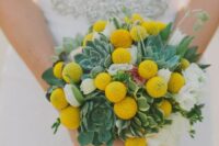 a cute wedding bouquet of white blooms, billy balls, succulents is a lovely and simple idea for a spring or summer wedding