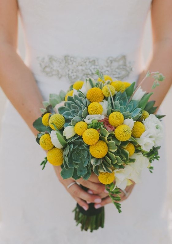 a cute wedding bouquet of white blooms, billy balls, succulents is a lovely and simple idea for a spring or summer wedding