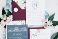 a fresh and bright fall wedding invitation suite with purple envelopes and floral lining and touches of slate grey