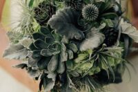 a greenery wedding bouquet with succulents, allias, foliage, air plants and grasses shaped as a ball