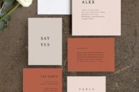 a pastel and muted color wedding invitation suite with simple black lettering is a cool idea for an earthy fall wedding