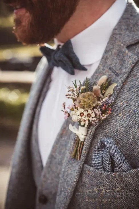 a lovey boutonniere for a winter wedding