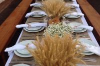 wheat centrepieces works great for a fall wedding