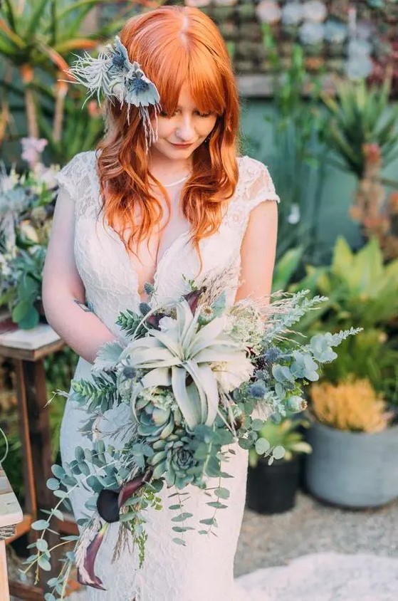a super textural wedding bouquet of greenery, thistles, succulents and some air plants is amazing for a boho bride