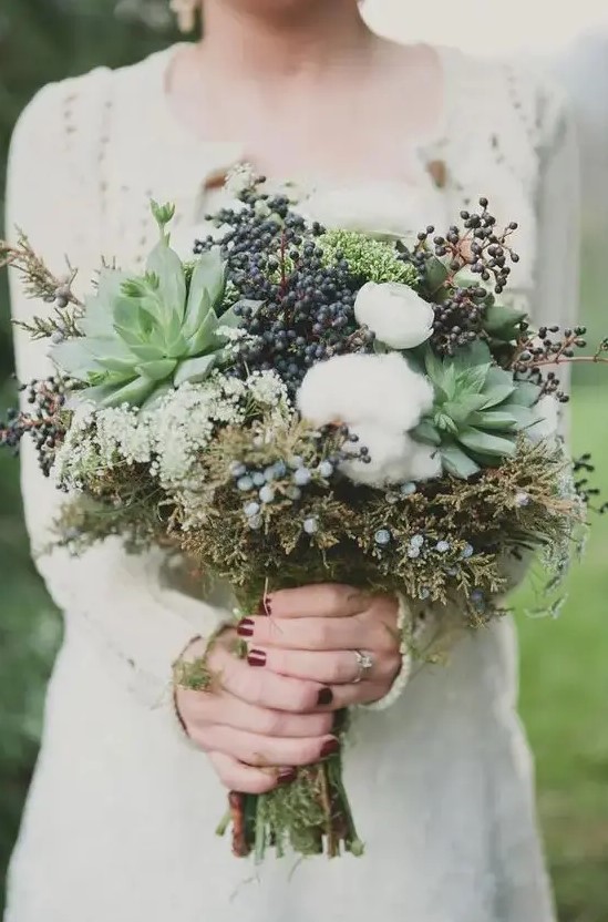 a textural bouquet with cotton, succulents, privet berries and textural foliage will be a gorgeous idea for many winter weddings