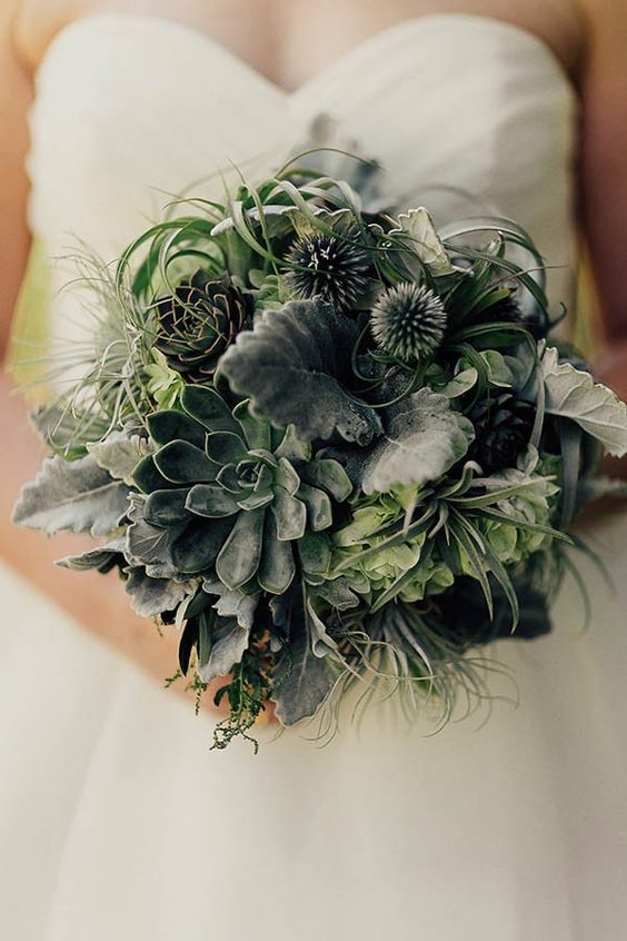 a textural wedding bouquet of pale foliage, succulents, air plants, greenery and some seed pods is a gorgeous idea