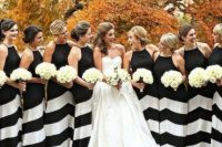elegant black and white halte rneckline maxi bridesmaid dresses with black bodices and wide stripes are great for a refined wedding