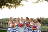 strapless midi striped bridesmaid dresses with horizontal and diagonal stripes, mismatching shoes and colorful wedding bouquets