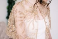 a gold embellished and embroidered capelet will add a touch of color and chic to the bridal look