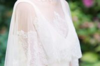 a lace capelet with a lace turtleneck collar will add a vintage feel to your bridal look