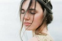 a unique gold leaf bridal crown and a wedding dress with matching gold embroidered leaves for a chic look