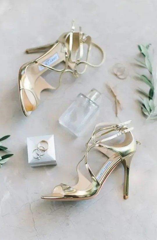 bold metallic gold strappy wedding shoes will bring glam elegance to your super glam and shiny bridal look