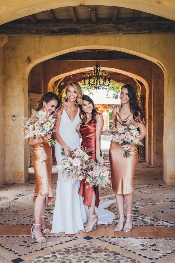 chic gold and rust knee and midi slip bridesmaid dresses and nude heels for a refined and cool fall wedding