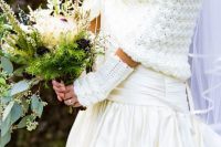 bride in a sweater with crochet gloves