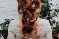 gorgeous ginger hair styled into a low updo with twists and texture, with neutral blooms and greenery is great for a fall wedding