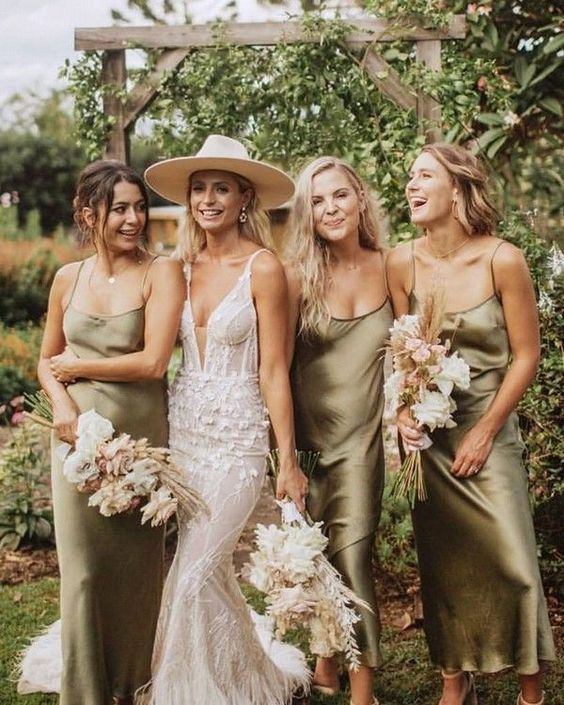 gorgeous sage green slip midi bridesmaid dresses are a great idea for a spring, summer or fall boho wedding